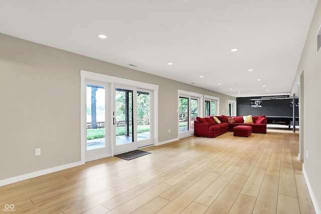 22 Point Ln, Arcadia, IN 46030 - living area with light wood-style flooring and recessed lighting