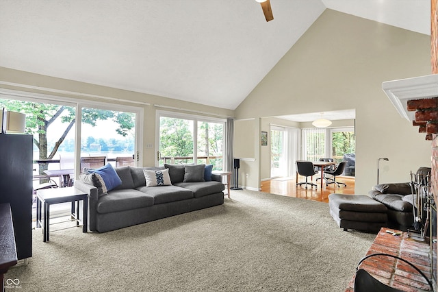 22 Point Ln, Arcadia, IN 46030 - living room with carpet floors, high vaulted ceiling, healthy amount of natural light, and ceiling fan