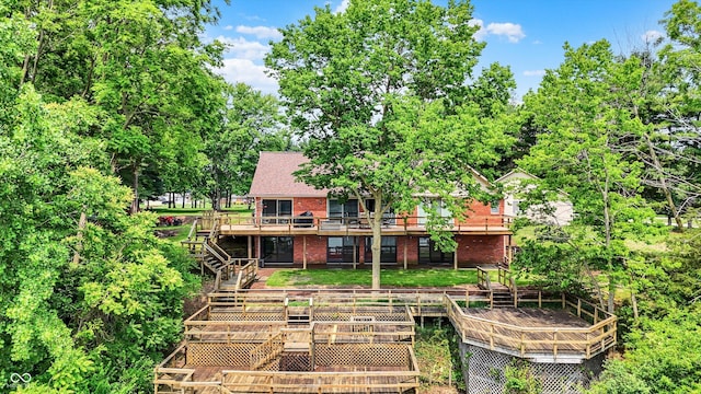 22 Point Ln, Arcadia, IN 46030 - back of house with stairway, a wooden deck, and brick siding