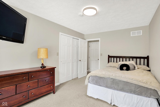 22 Point Ln, Arcadia, IN 46030 - bedroom featuring light carpet, a closet, and a textured ceiling