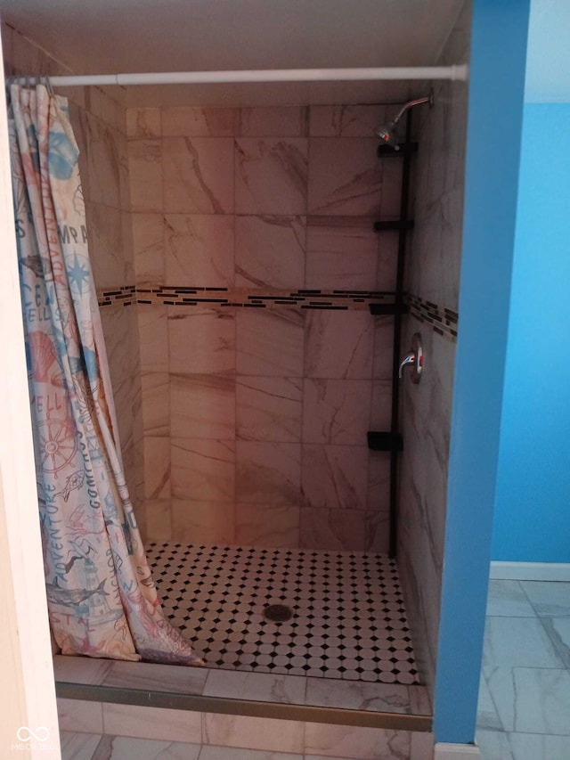 full bathroom featuring a stall shower