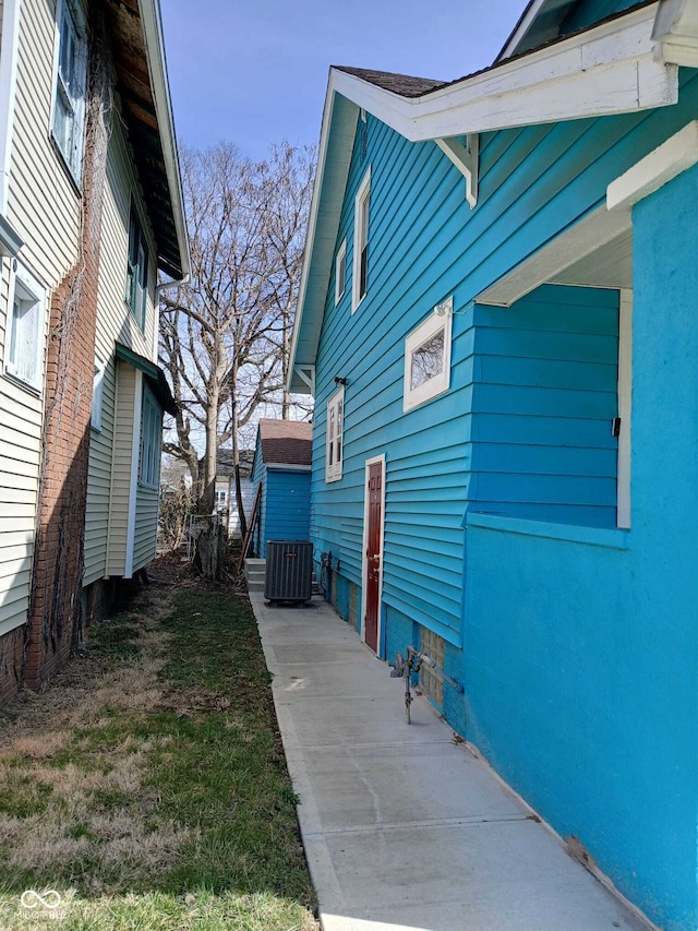 view of property exterior featuring central AC