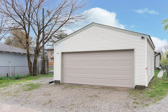 detached garage with fence
