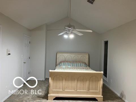 1054 Carters Grv, Indianapolis, IN 46260 - bedroom featuring vaulted ceiling, carpet flooring, baseboards, and ceiling fan