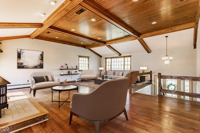 7859 N Chester Ave, Indianapolis, IN 46240 - living area featuring a baseboard radiator, wood-type flooring, and a chandelier