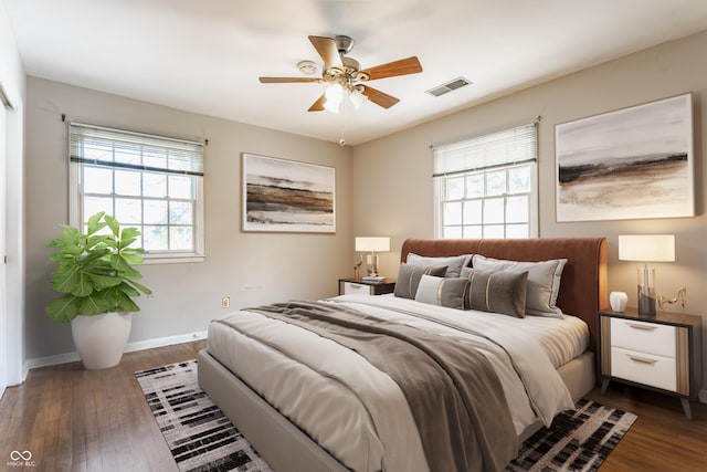 7859 N Chester Ave, Indianapolis, IN 46240 - bedroom featuring dark wood-style flooring, baseboards, and a ceiling fan