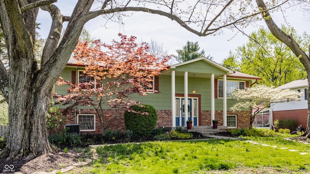 7859 N Chester Ave, Indianapolis, IN 46240 - view of front facade featuring brick siding and french doors