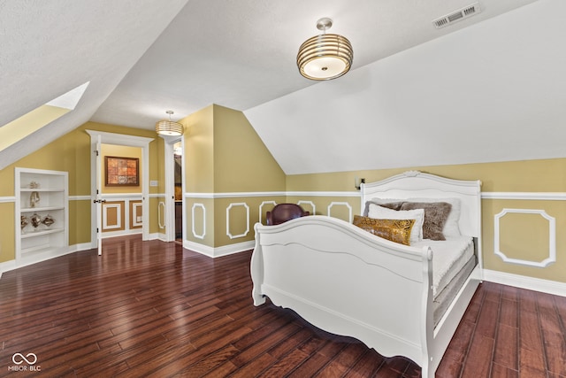 10821 Club Point Dr, Fishers, IN 46037 - bedroom with baseboards, visible vents, lofted ceiling with skylight, and hardwood / wood-style floors