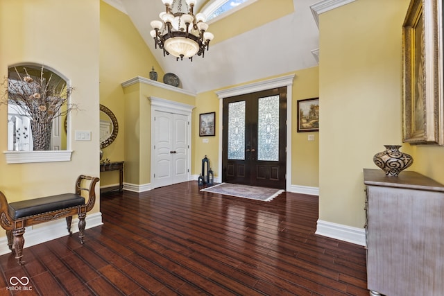 10821 Club Point Dr, Fishers, IN 46037 - entryway with french doors, high vaulted ceiling, baseboards, a chandelier, and wood finished floors
