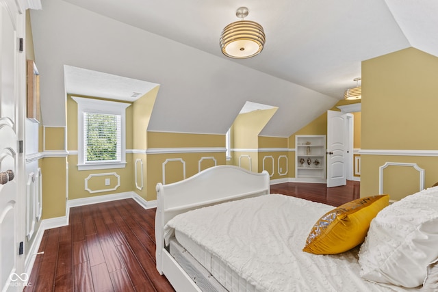 10821 Club Point Dr, Fishers, IN 46037 - bedroom with hardwood / wood-style floors, baseboards, and lofted ceiling