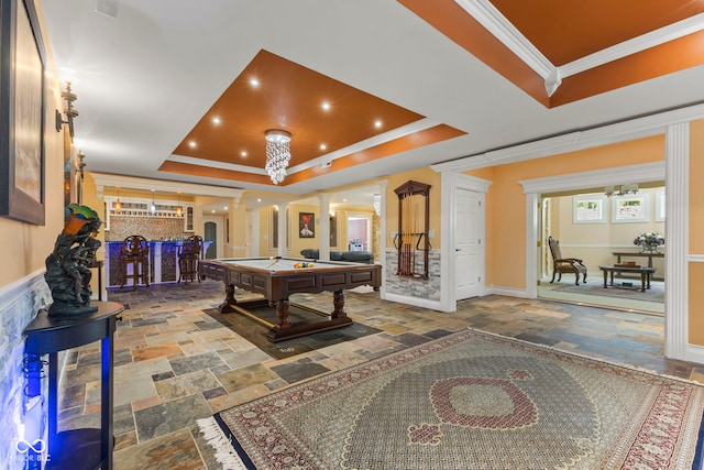 10821 Club Point Dr, Fishers, IN 46037 - game room featuring a tray ceiling, decorative columns, crown molding, and stone tile flooring