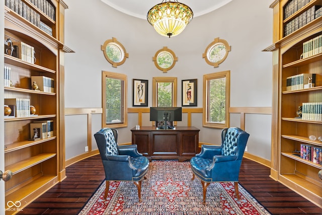 10821 Club Point Dr, Fishers, IN 46037 - office with a chandelier, crown molding, a towering ceiling, dark wood-type flooring, and built in features