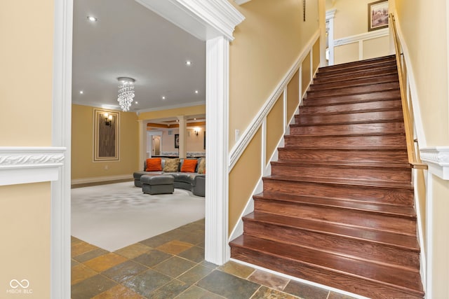 10821 Club Point Dr, Fishers, IN 46037 - stairs with carpet floors, ornamental molding, stone tile floors, and ornate columns