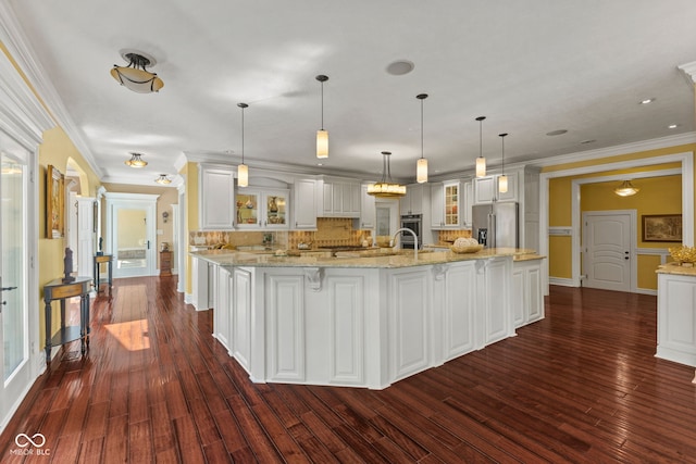 10821 Club Point Dr, Fishers, IN 46037 - kitchen featuring white cabinetry, tasteful backsplash, dark wood-style flooring, ornamental molding, and high end refrigerator