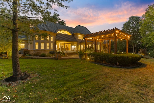 10821 Club Point Dr, Fishers, IN 46037 - back of property featuring a pergola, a lawn, and a tile roof
