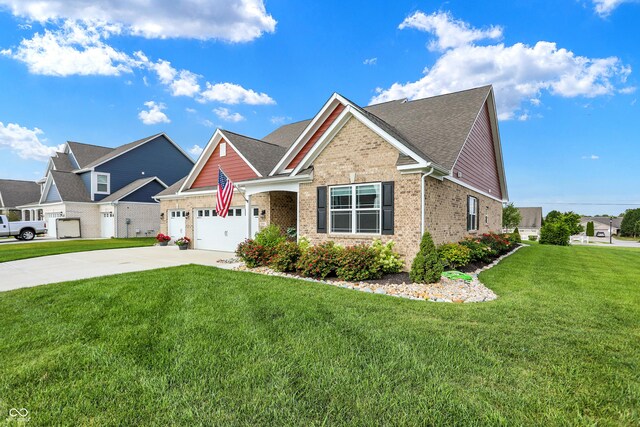 1684 Beach St, Greenwood, IN 46143 - view of front of home featuring driveway, brick siding, a front lawn, and an attached garage