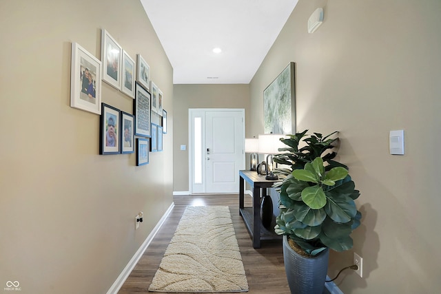 1684 Beach St, Greenwood, IN 46143 - corridor with dark wood-type flooring, baseboards, and recessed lighting