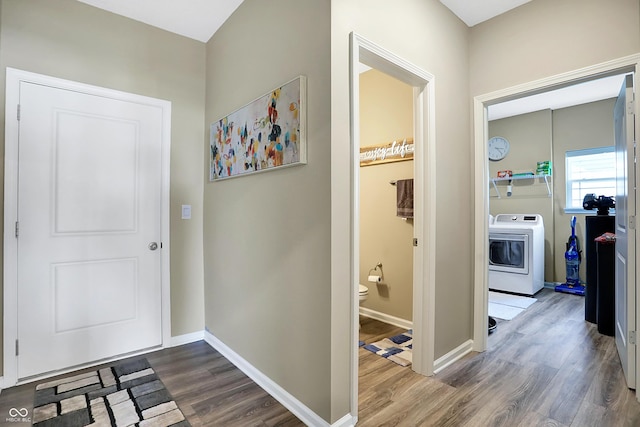 1684 Beach St, Greenwood, IN 46143 - hall featuring dark wood-type flooring, baseboards, and washer / dryer