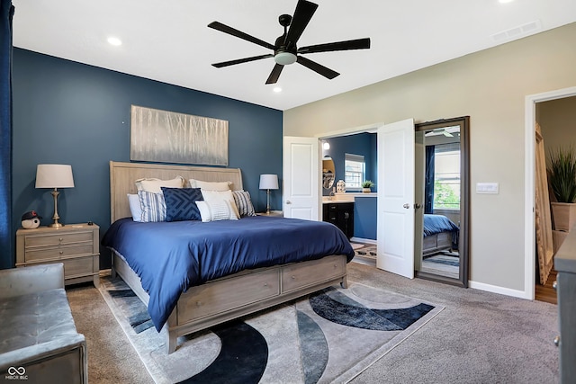 1684 Beach St, Greenwood, IN 46143 - bedroom featuring carpet flooring, visible vents, baseboards, ceiling fan, and ensuite bath