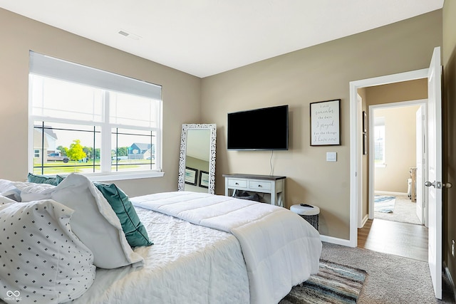1684 Beach St, Greenwood, IN 46143 - carpeted bedroom with baseboards and visible vents