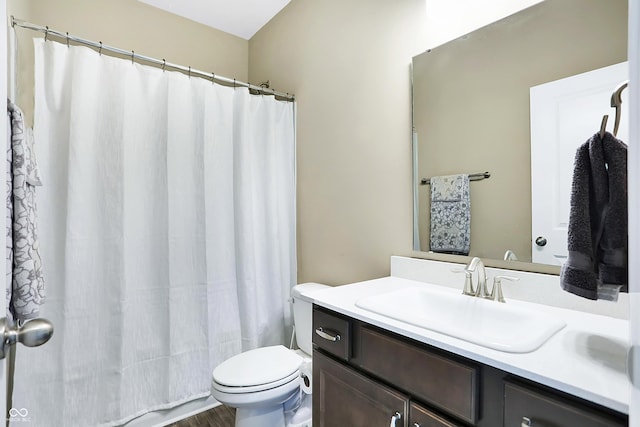 1684 Beach St, Greenwood, IN 46143 - bathroom featuring curtained shower, toilet, and vanity