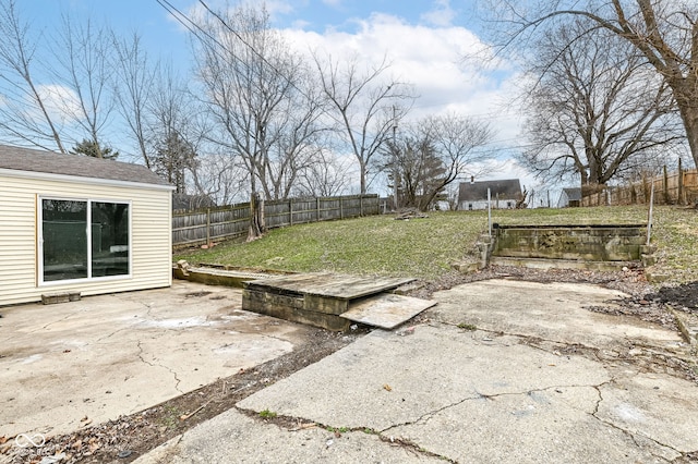view of yard featuring a patio area and a fenced backyard