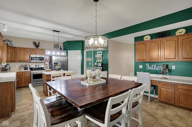 dining space featuring a notable chandelier