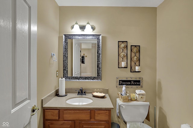 half bath with toilet and vanity