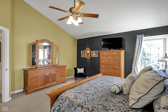 bedroom featuring baseboards, ceiling fan, light colored carpet, and lofted ceiling