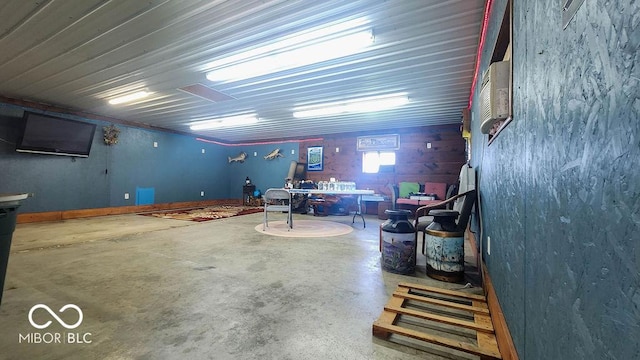 interior space with unfinished concrete flooring