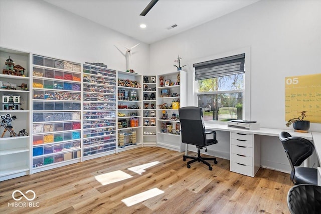 office with recessed lighting, visible vents, and wood finished floors