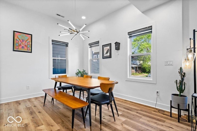 dining area with visible vents, recessed lighting, light wood-style flooring, and baseboards