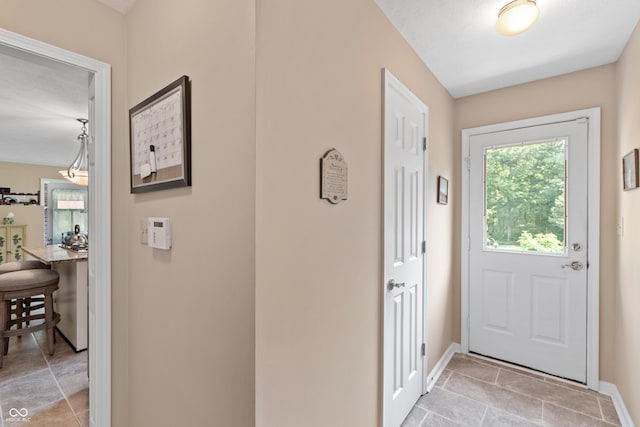 7341 Campfire Run, Indianapolis, IN 46236 - foyer with baseboards and light tile patterned floors