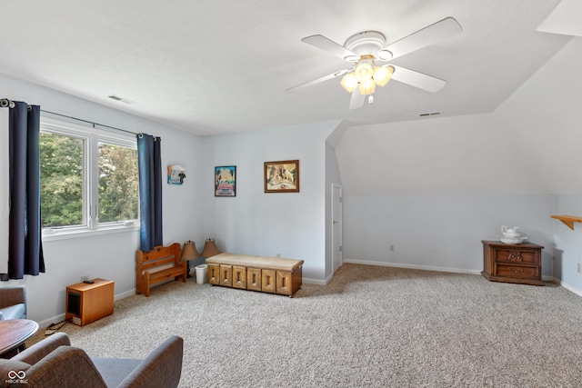 7341 Campfire Run, Indianapolis, IN 46236 - living area with carpet floors, ceiling fan, baseboards, and vaulted ceiling