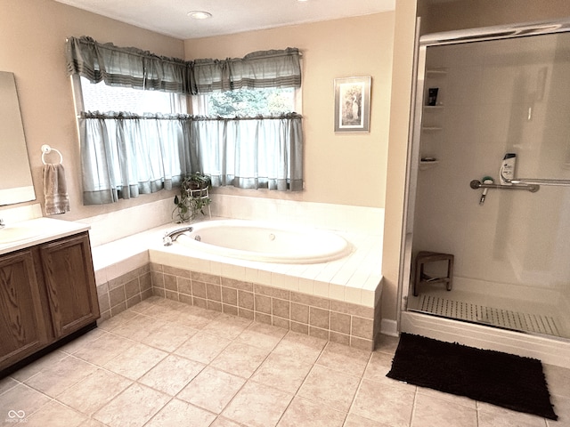 7341 Campfire Run, Indianapolis, IN 46236 - full bathroom with vanity, a stall shower, a bath, and tile patterned flooring