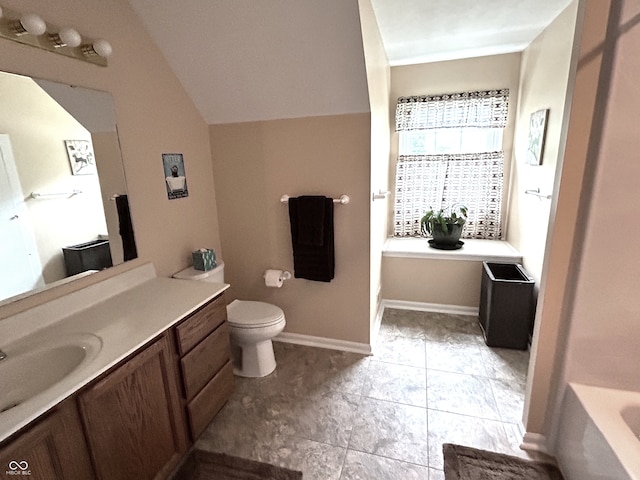 7341 Campfire Run, Indianapolis, IN 46236 - full bath with vanity, toilet, lofted ceiling, a tub to relax in, and tile patterned floors