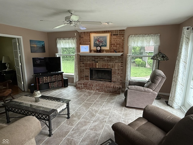 7341 Campfire Run, Indianapolis, IN 46236 - living room featuring plenty of natural light, a ceiling fan, and a brick fireplace
