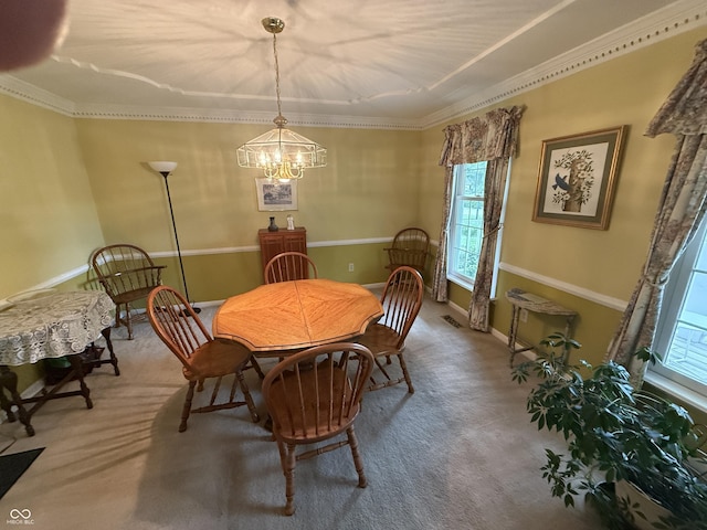 7341 Campfire Run, Indianapolis, IN 46236 - carpeted dining space with a chandelier and crown molding