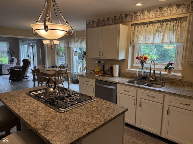 7341 Campfire Run, Indianapolis, IN 46236 - kitchen with a sink, appliances with stainless steel finishes, plenty of natural light, white cabinetry, and recessed lighting
