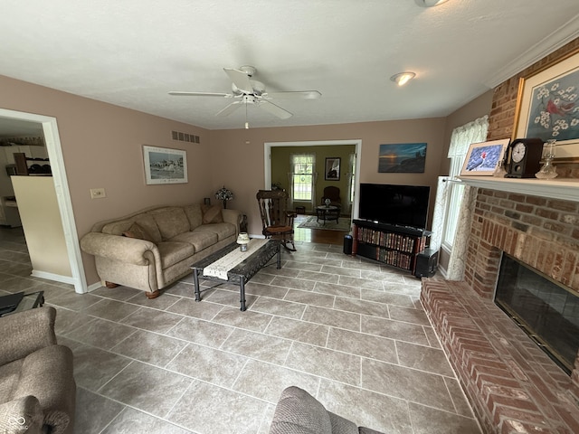 7341 Campfire Run, Indianapolis, IN 46236 - living room featuring a ceiling fan, a fireplace, and baseboards