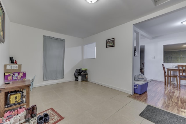 5110 Chelsea Rd, Indianapolis, IN 46241 - living area with baseboards and light tile patterned floors