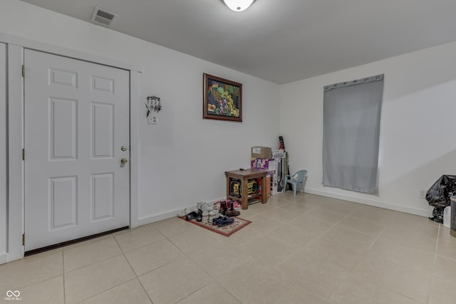5110 Chelsea Rd, Indianapolis, IN 46241 - foyer featuring baseboards, visible vents, and light tile patterned floors