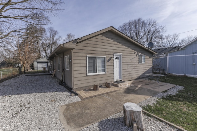 5110 Chelsea Rd, Indianapolis, IN 46241 - rear view of property with fence and a patio
