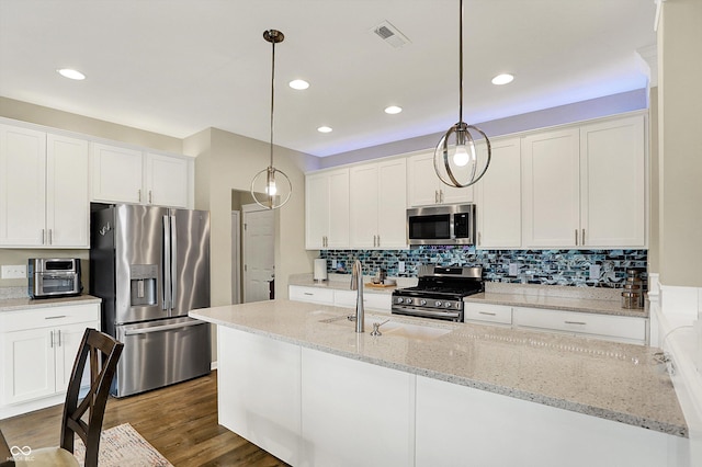 15752 Matthews Ln, Noblesville, IN 46060 - kitchen with a sink, white cabinets, and stainless steel appliances