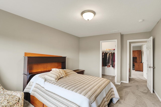 15752 Matthews Ln, Noblesville, IN 46060 - bedroom with baseboards, a closet, a spacious closet, and light colored carpet