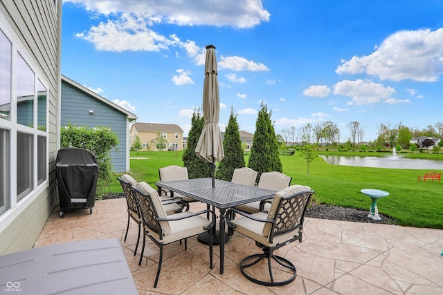 15752 Matthews Ln, Noblesville, IN 46060 - view of patio / terrace featuring outdoor dining area, a water view, and a grill