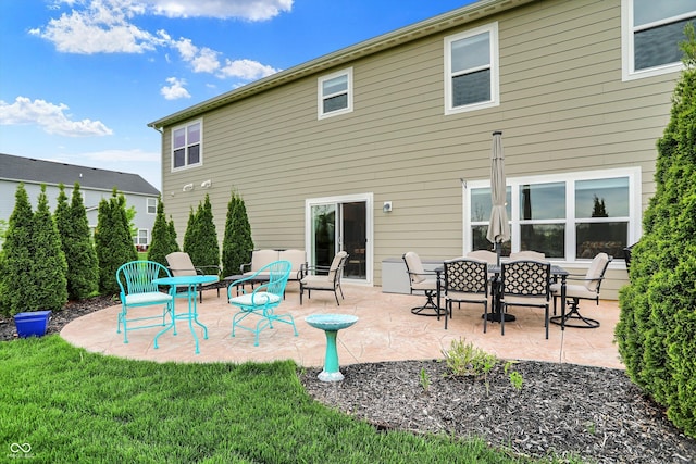 15752 Matthews Ln, Noblesville, IN 46060 - back of house with a lawn and a patio area