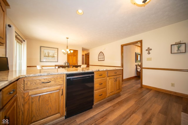 7732 Ashtree Dr, Indianapolis, IN 46259 - kitchen with brown cabinetry, a notable chandelier, black dishwasher, and wood finished floors