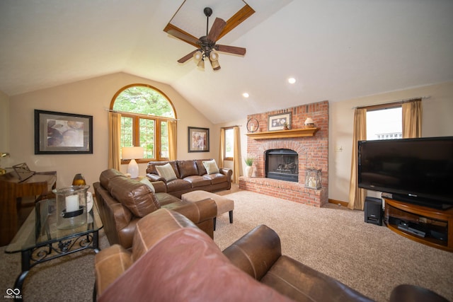 7732 Ashtree Dr, Indianapolis, IN 46259 - living room featuring vaulted ceiling, ceiling fan, carpet floors, a fireplace, and recessed lighting