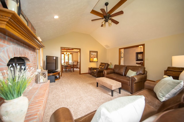 7732 Ashtree Dr, Indianapolis, IN 46259 - carpeted living area with lofted ceiling, baseboards, a fireplace, and ceiling fan